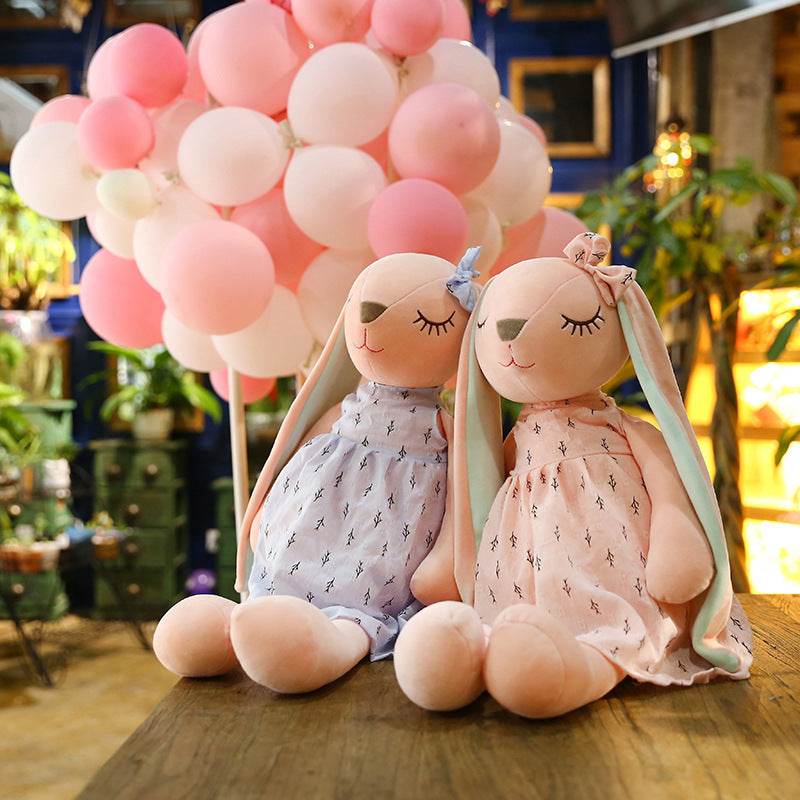 Poppy: Cute Pink and Blue Fluffy Bunny Plushie.