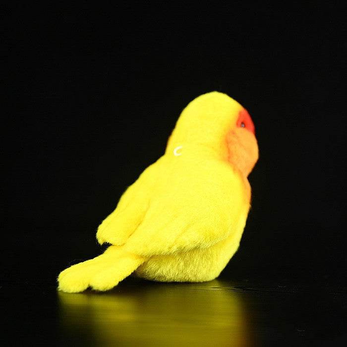 Poppy: Chirpy Parrot Suffed Animal.