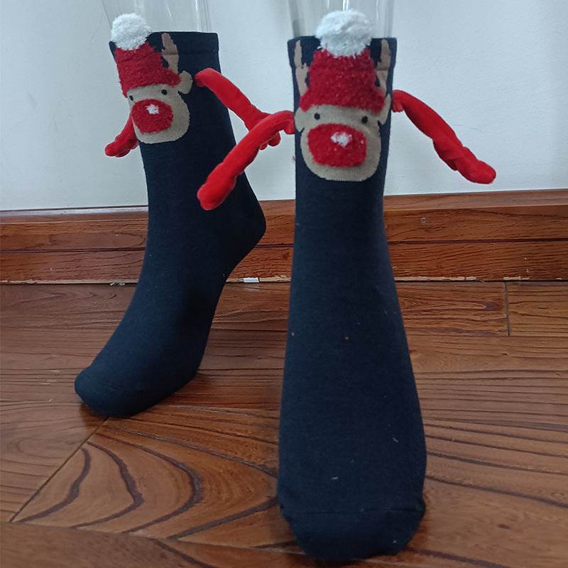 Hand holding Christmas Socks - Goodlifebean