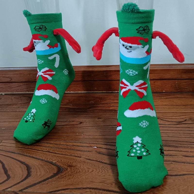 Hand holding Christmas Socks - Goodlifebean