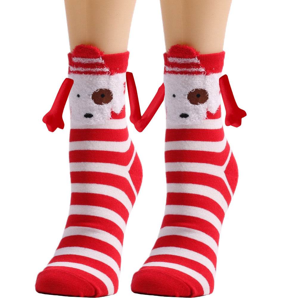 Hand holding Christmas Socks - Goodlifebean