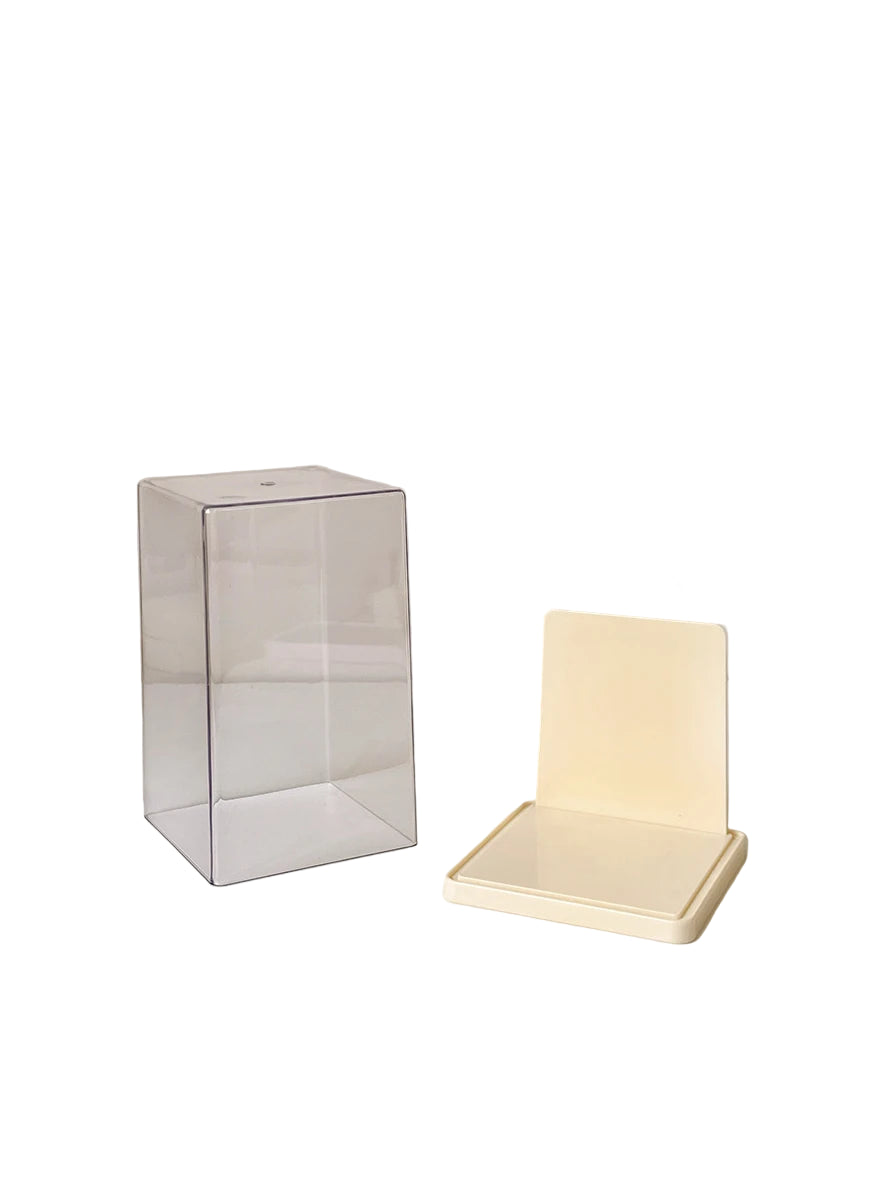 Clear plastic labubu display box with beige stand on a white background 