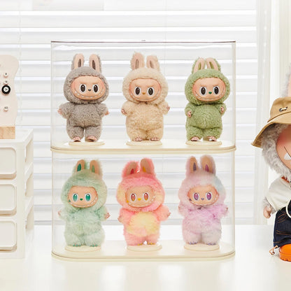 Set of colorful Labubu plushie displayed in a clear case.