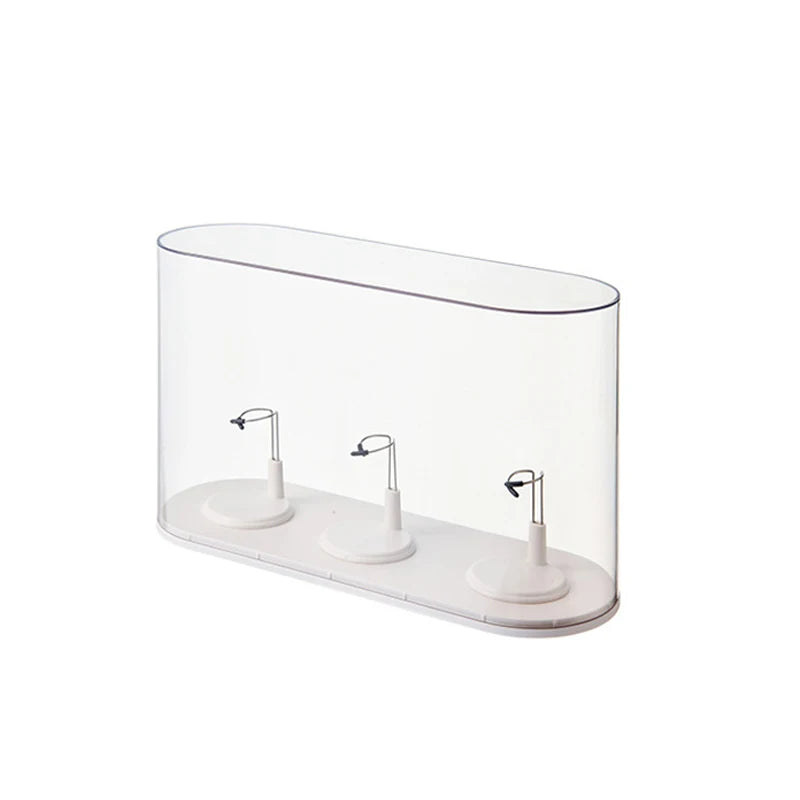 Modern wall-mounted sink with three faucet options on a white background