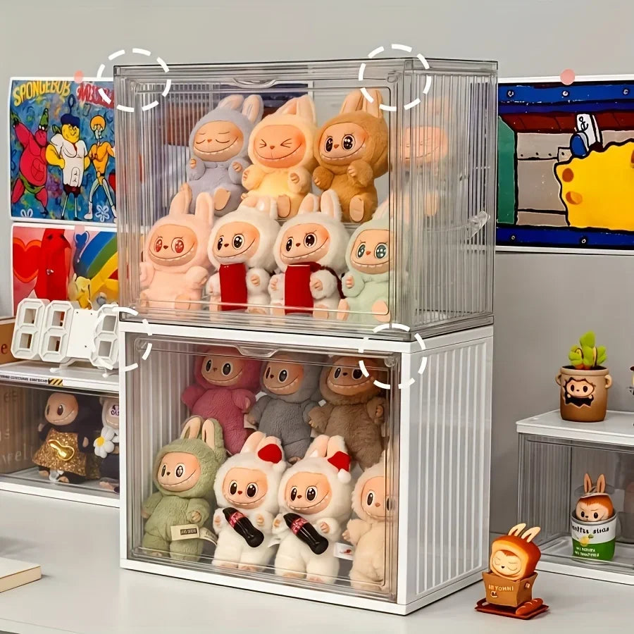 Stack of clear toy display cases with various small figurines on a shelf.