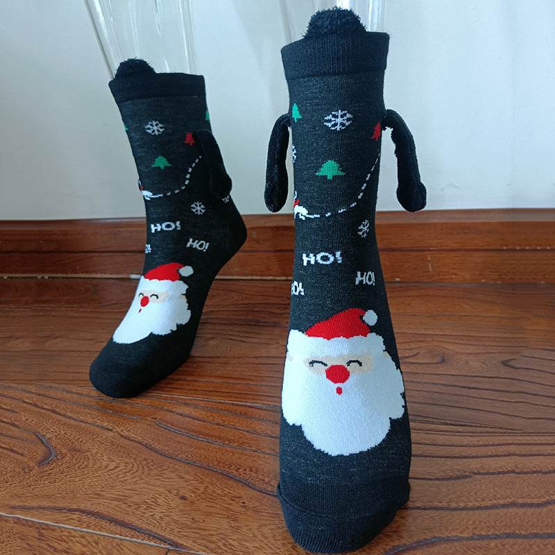 Hand holding Christmas Socks - Goodlifebean