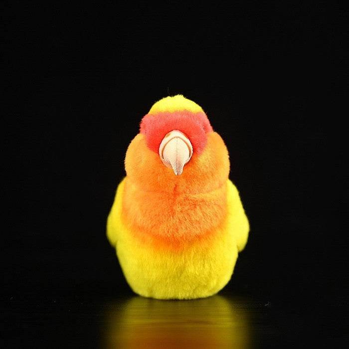 Poppy: Chirpy Parrot Suffed Animal.