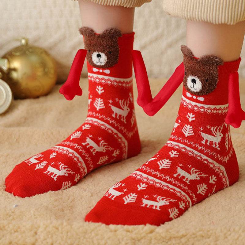 Hand holding Christmas Socks - Goodlifebean